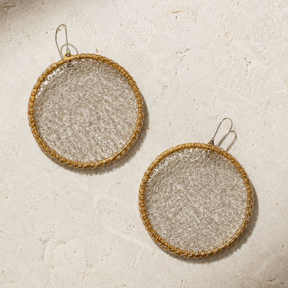 Crochet Eclipse hand-crocheted sterling silver earrings on brass hoops by JYOCO