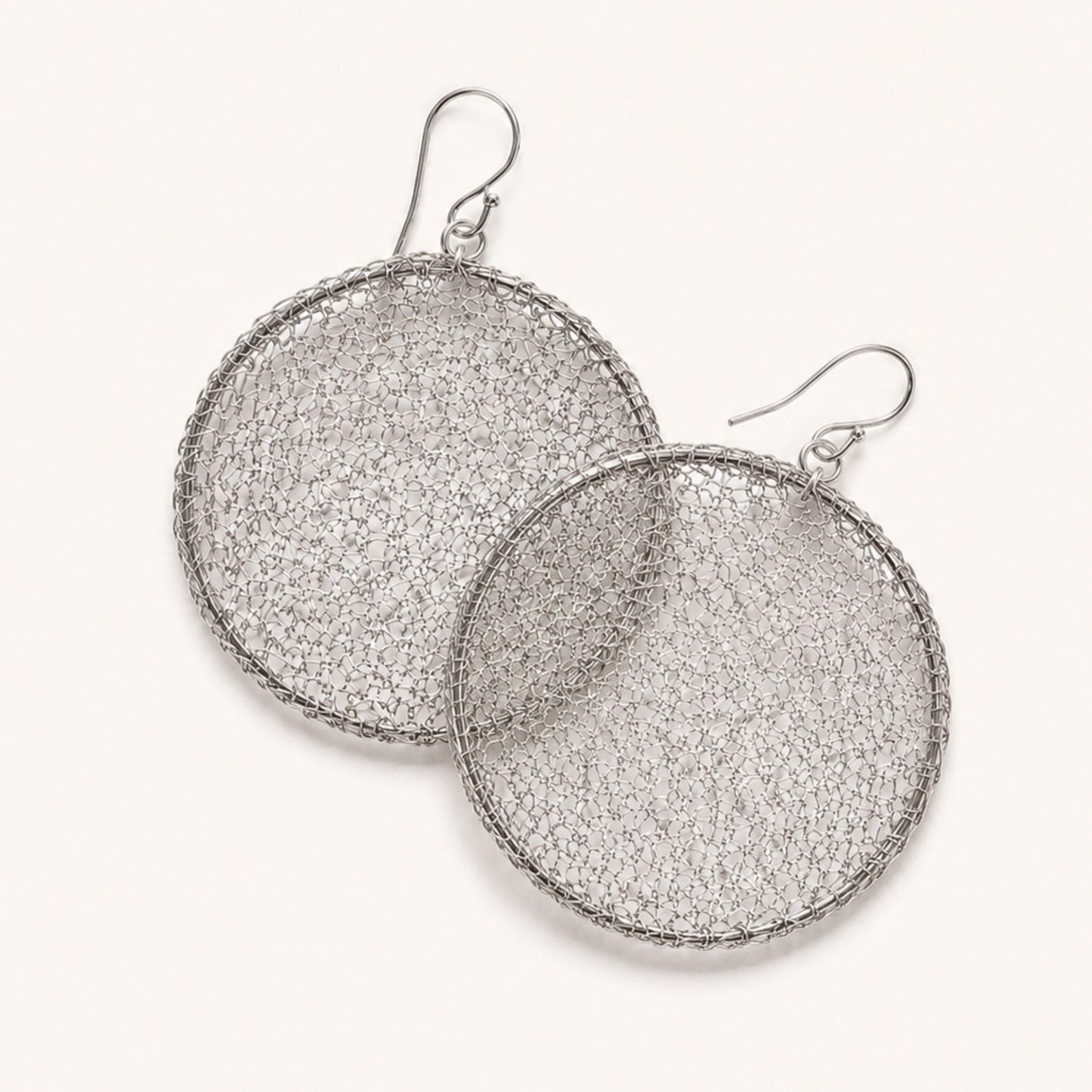 Crochet Moon hand-crocheted sterling silver earrings by JYOCO