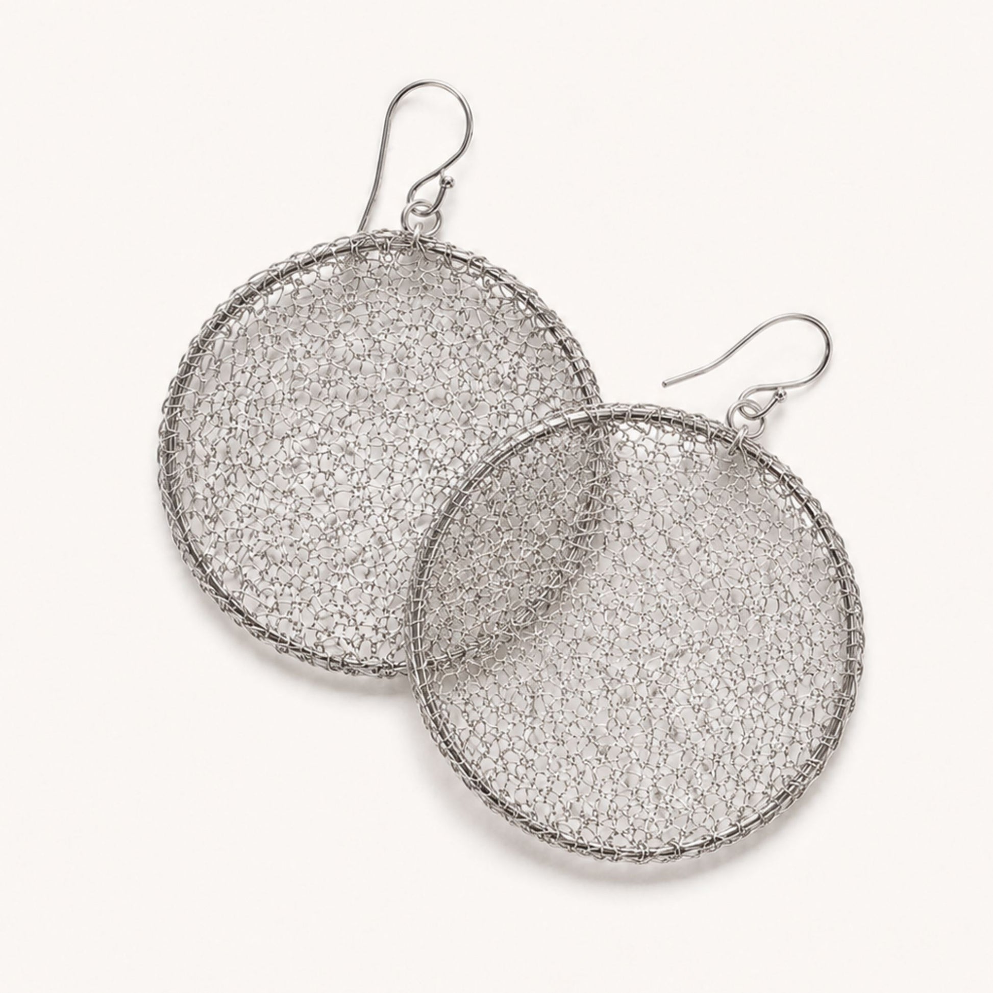 Crochet Moon hand-crocheted sterling silver earrings by JYOCO